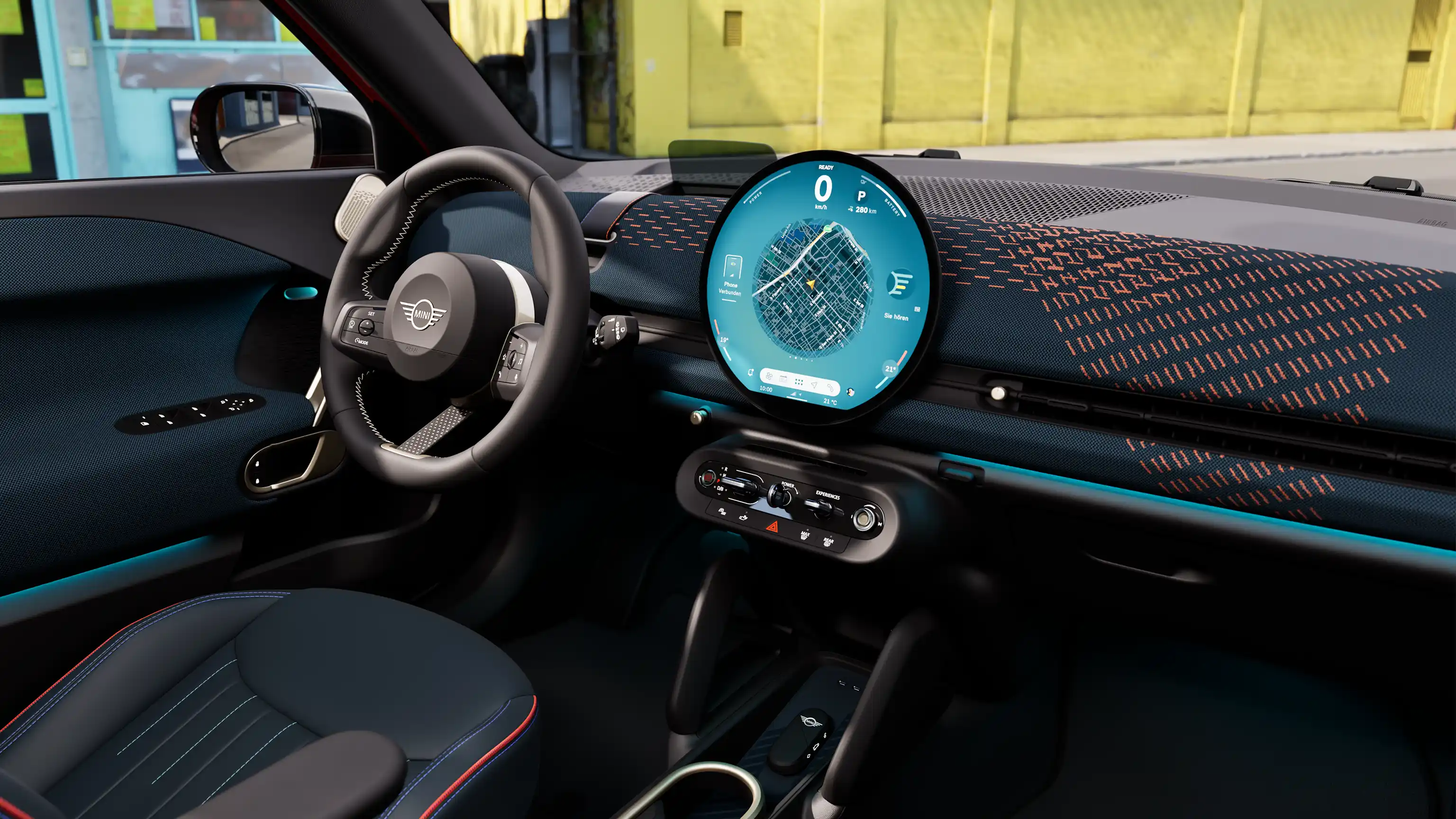Vídeo de apresentação do interior de um MINI Aceman elétrico em detalhe. A câmara percorre o interior e mostra os estofos azuis