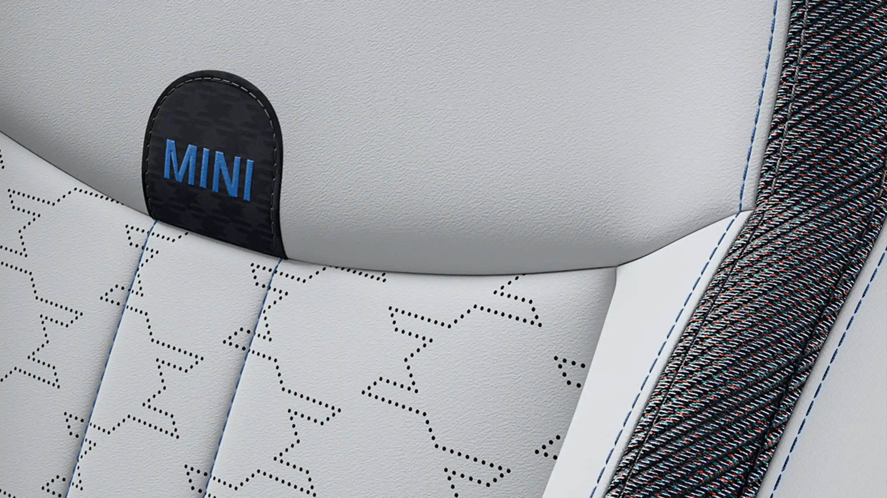 Vista do MINI Cooper de 5 portas, Classic Style com bancos em vescin/tecido Cinzento/Azul