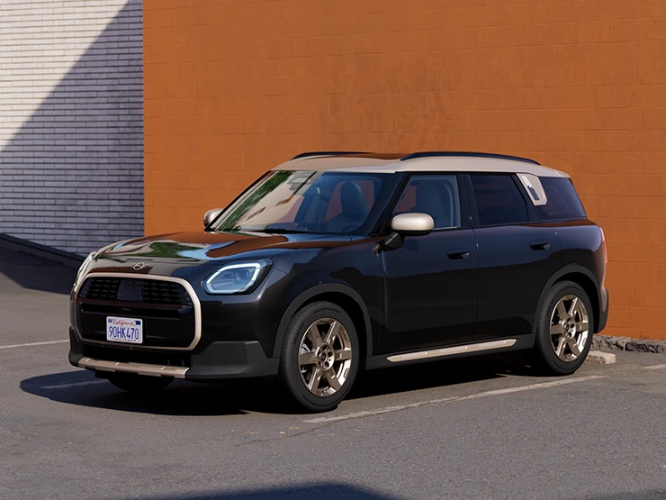 Vista frontal do MINI Countryman em Midnight Black e tejadilho Vibrant Silver estacionado.