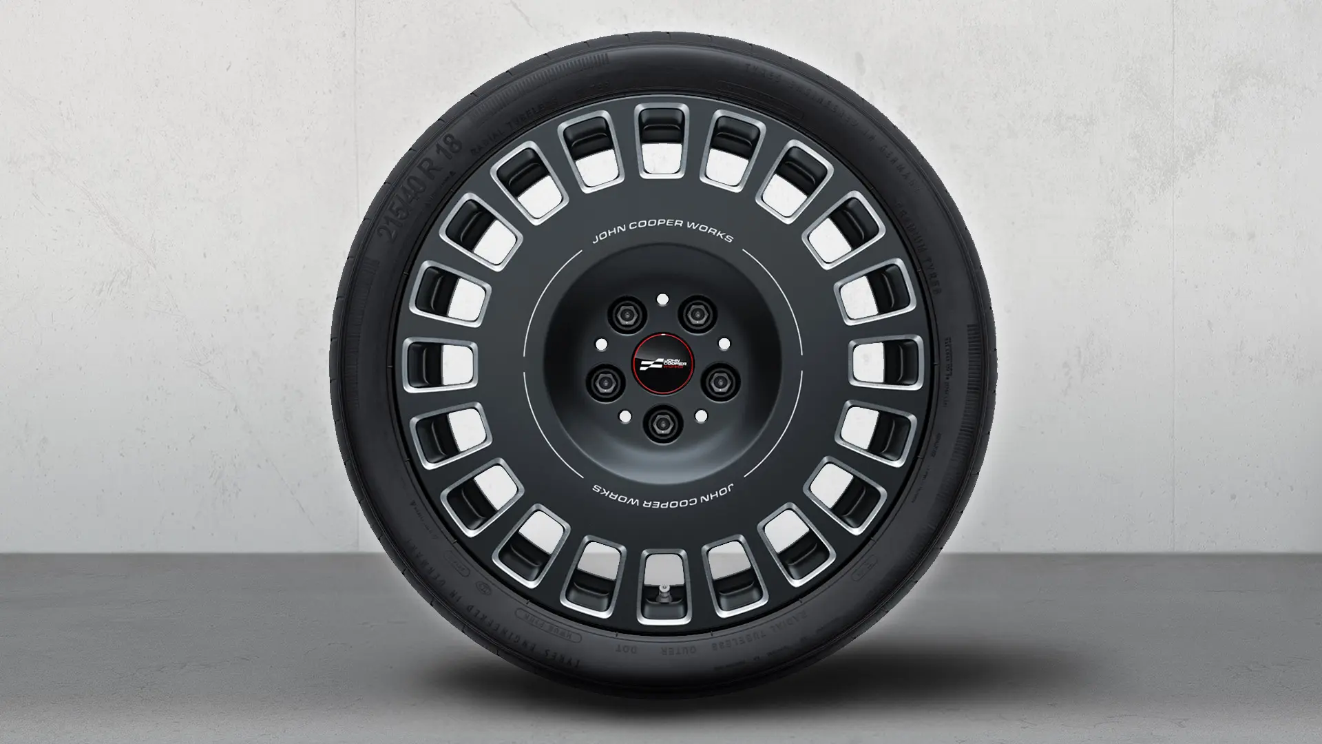 Conjunto completo de rodas de verão com jantes de liga leve JCW Rallye Spoke 964, de 18", em Frozen Midnight Grey bicolor, polidas