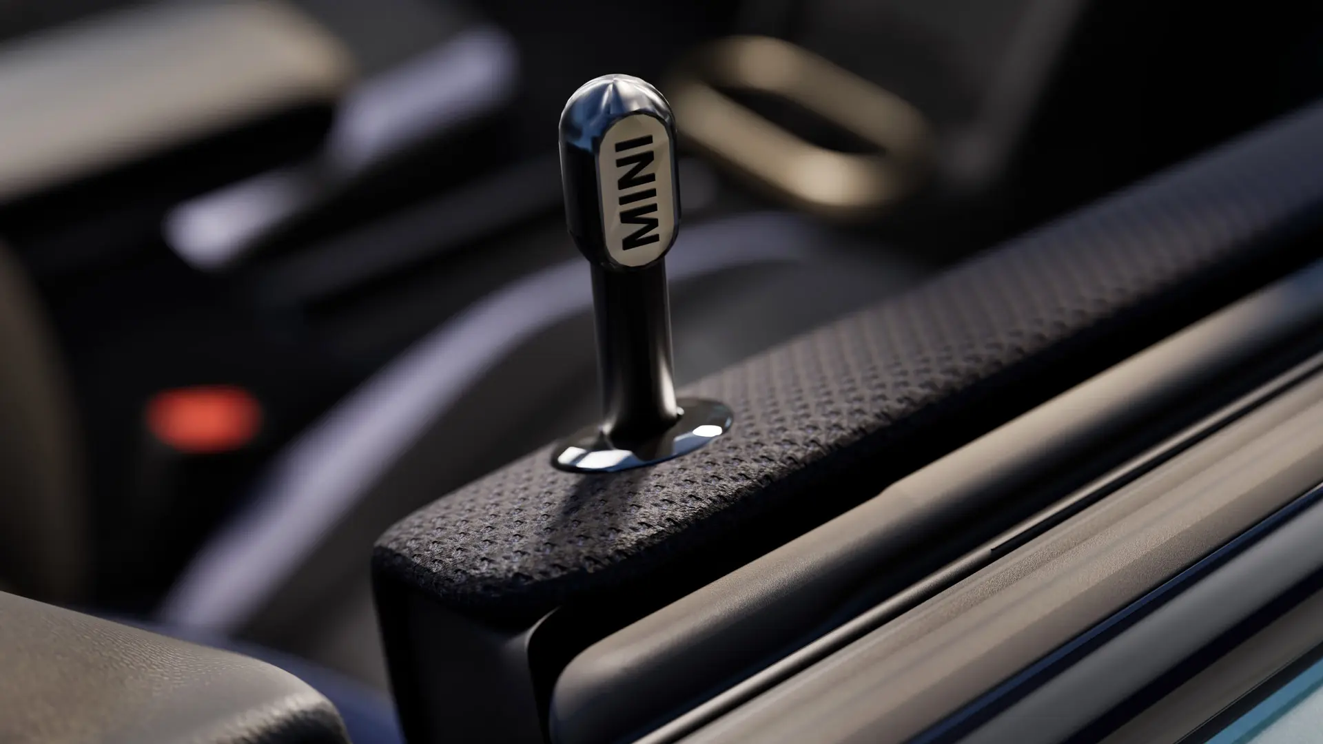 Grande plano do pino de bloqueio interior genuíno MINI em alumínio anodizado preto.